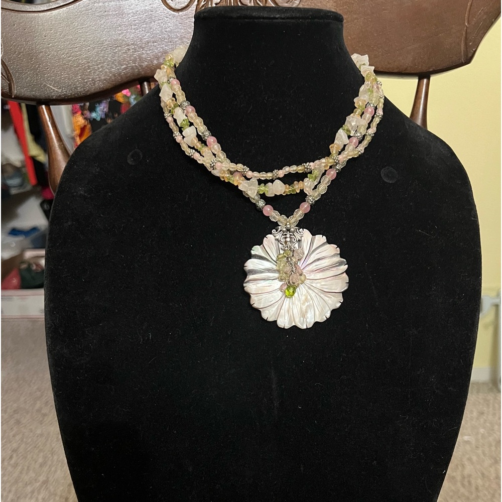 Beautiful multi strand beaded and stones necklace.